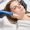 Partial female cosmetologist doing ultrasonic cleaning of face skin with skinpen with micro needle of young serious caucasian woman in blurred beauty salon. Concept of face skin care and rejuvenation